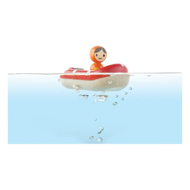 Bateau de sauvetage flottant sur l'eau