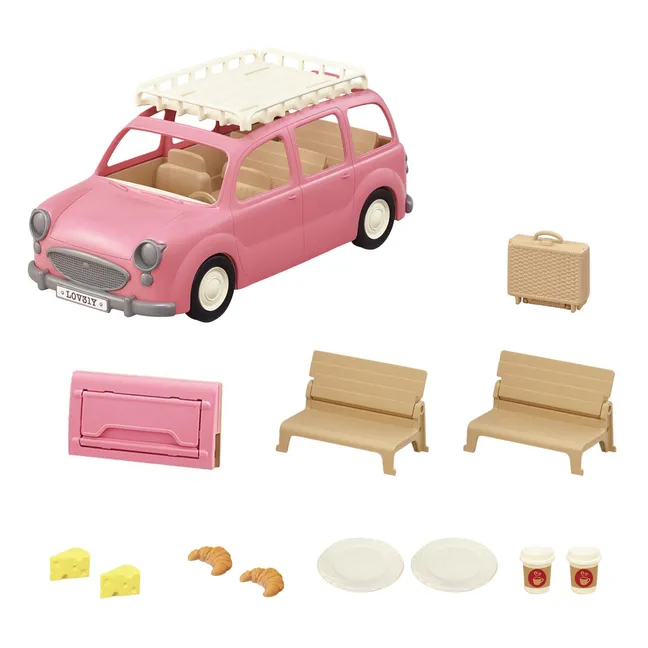 Der rosafarbene Minivan und Picknick-Set