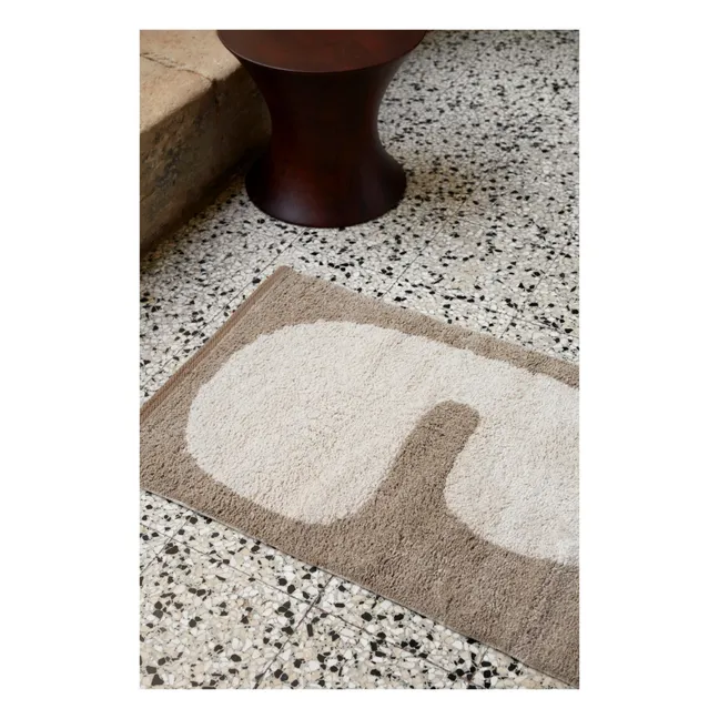 Colocar la alfombra de baño | Topo