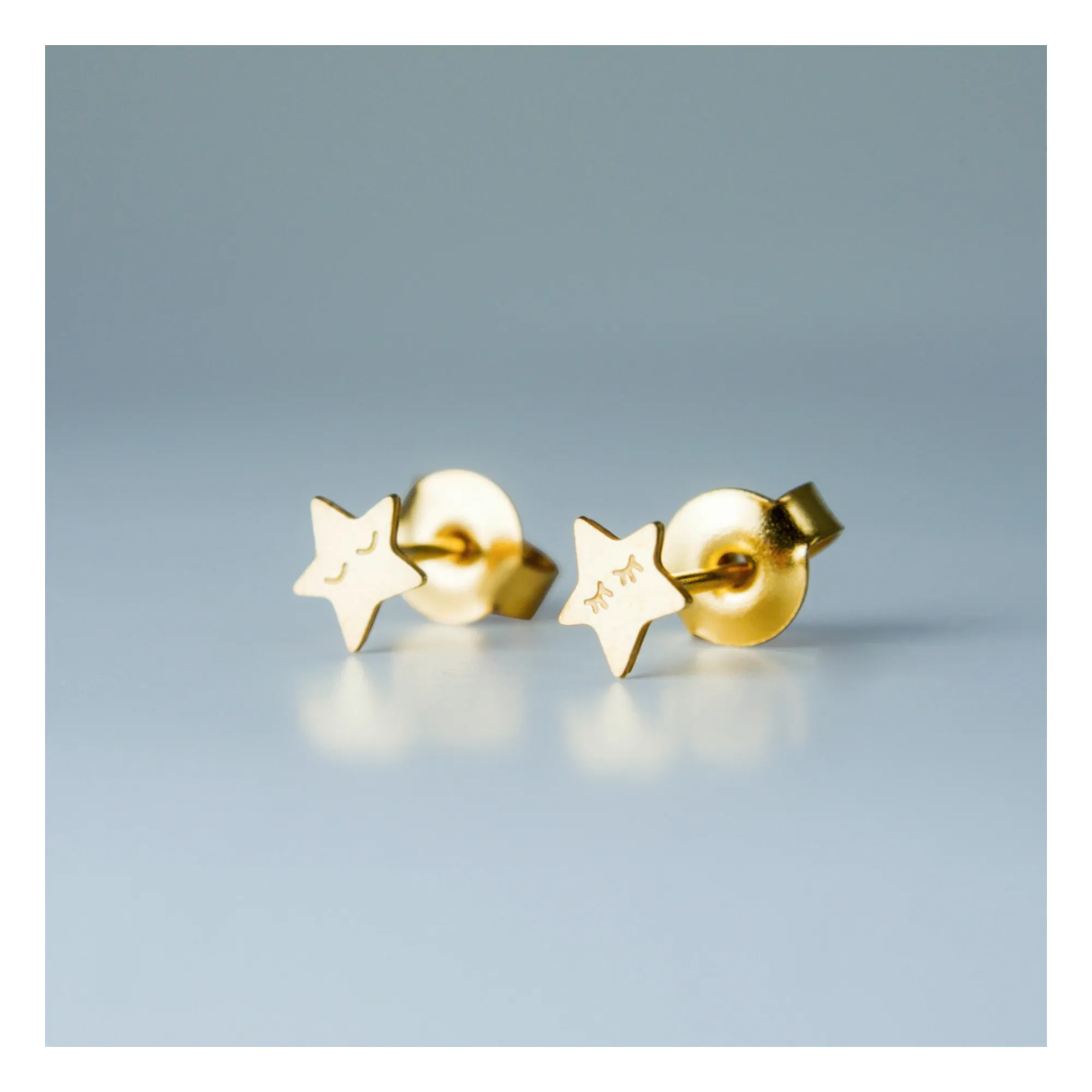 Adorabili Gold Asymmetrical Star Earrings
