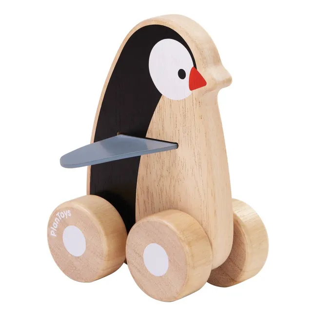 Pingüino de madera con ruedas