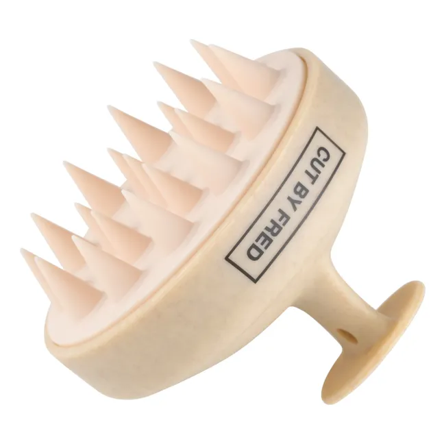 Brosse stimulante pour le cuir chevelu