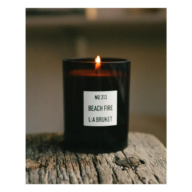 Vela perfumada Beach Fire - 260g | Sin tintes