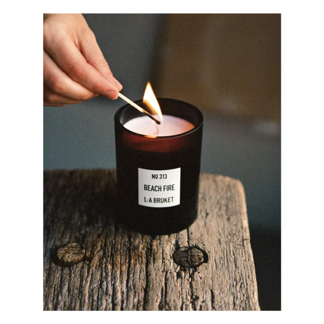 Vela perfumada Beach Fire - 260g | Sin tintes