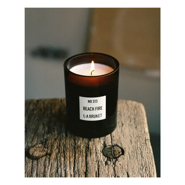 Vela perfumada Beach Fire - 260g | Sin tintes
