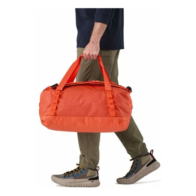 Black Hole Duffel 40L Recycled Fiber Backpack | Orange