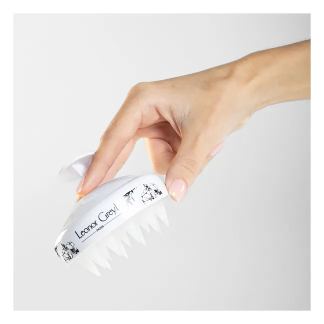 Scalp massaging brush 