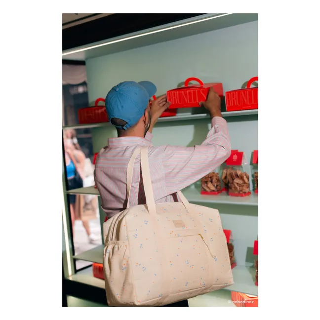Wasserdichte Wickeltasche Opera Orange Cherries | Beige
