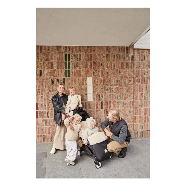 Cubrepiés universal para arnés fijo en piel de cordero | Milk