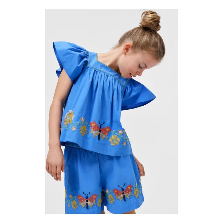 Top de volantes de algodón orgánico Rosalyn Butterfly | Azul- Imagen del producto n°1