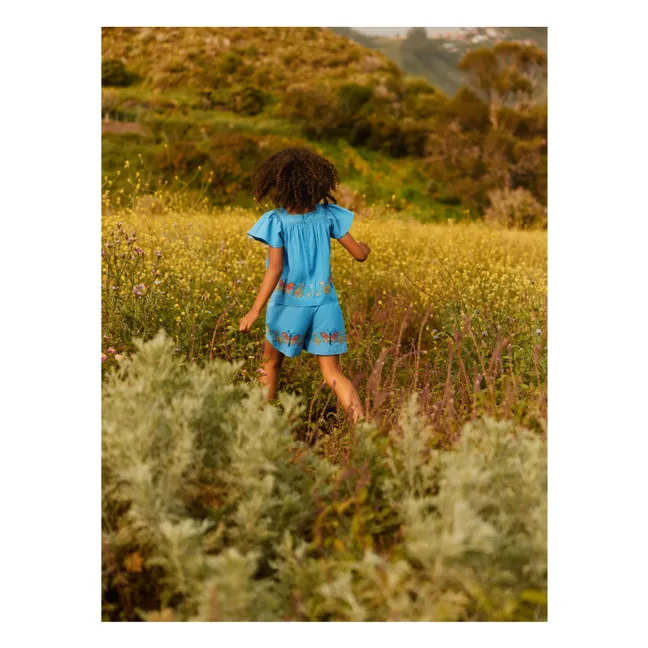 Top de volantes de algodón orgánico Rosalyn Butterfly | Azul