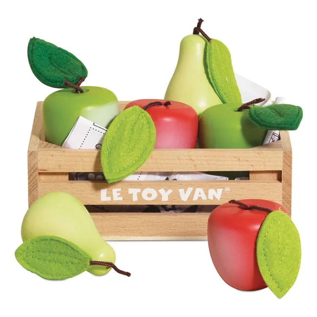 Jaula de manzanas y peras del mercado