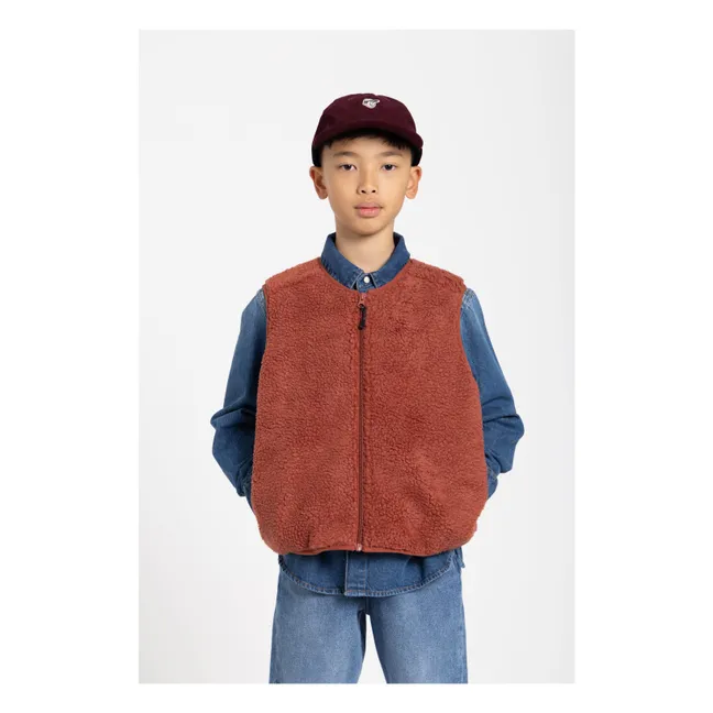 Sleeveless Sherpa Manner Jacket | Brick red