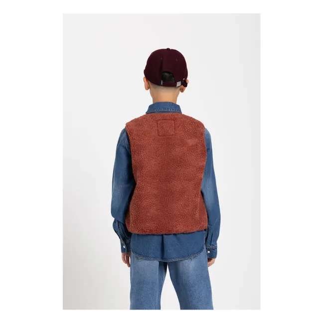 Sleeveless Sherpa Manner Jacket | Brick red