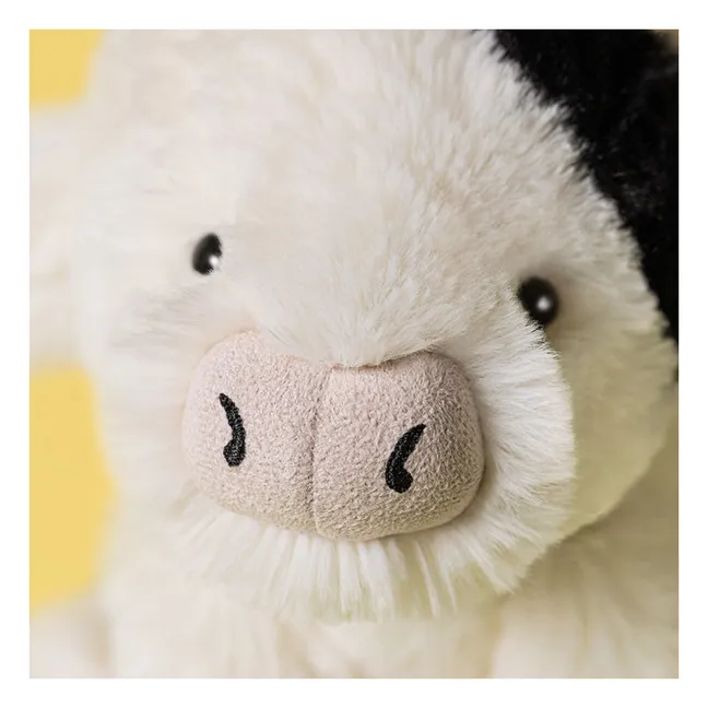 Elongated cow plush