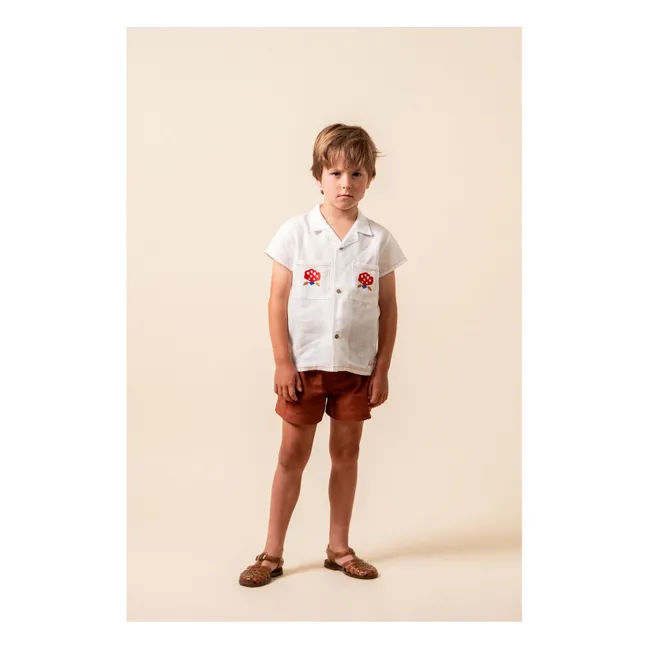 Linen shirt with embroidered pockets | White