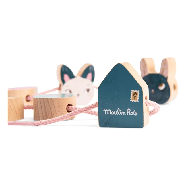 Ensartar cuentas - Après la pluie