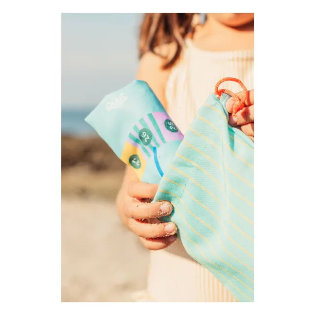 Caballitos / Juego de tres en raya en la playa