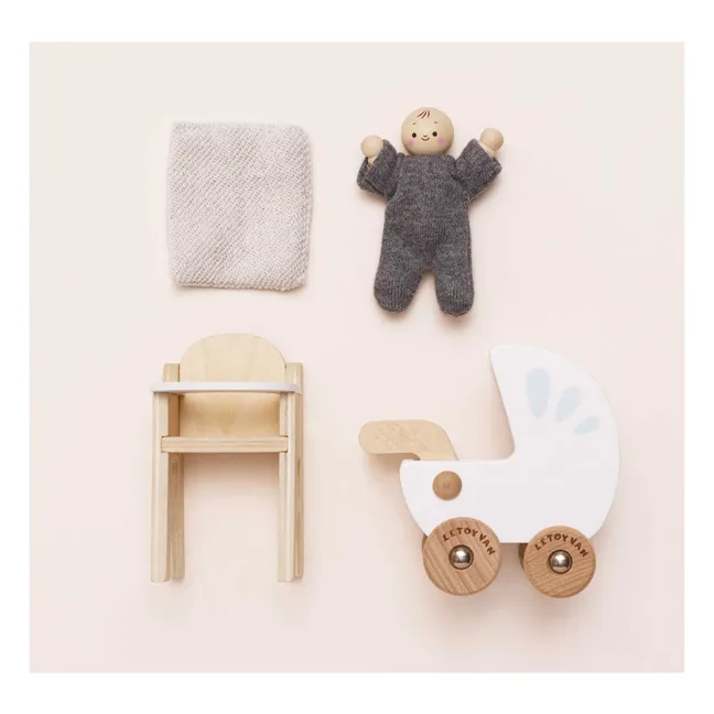 Bébé avec accessoires de nurserie