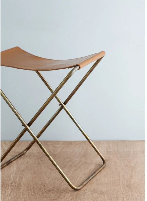 Tabouret pliant Nola en cuir